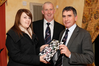 Northern Ireland Blue Cattle Club Member Naomi Gregg makes a presentation to outgoing Club Secretary Harold McKee in appreciation of his work for the Club. Looking on is Club Chairman Ivan Gordon. Picture: Columba O'Hare