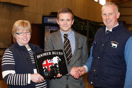 Libby Young, Secretary and Ivan Gordon, Chairman, NI Blue Cattle Club make a presentation to Boomer Birch, Staffordshire in appreciation of his judging